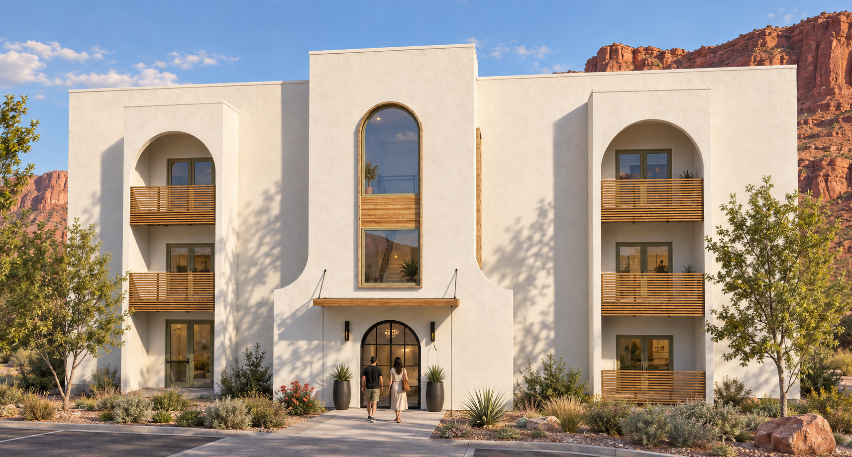 Architectural rendering of The Collaborative 1581 in Moab, with arched openings, warm off-white stucco, wood-look rails and desert landscaping.