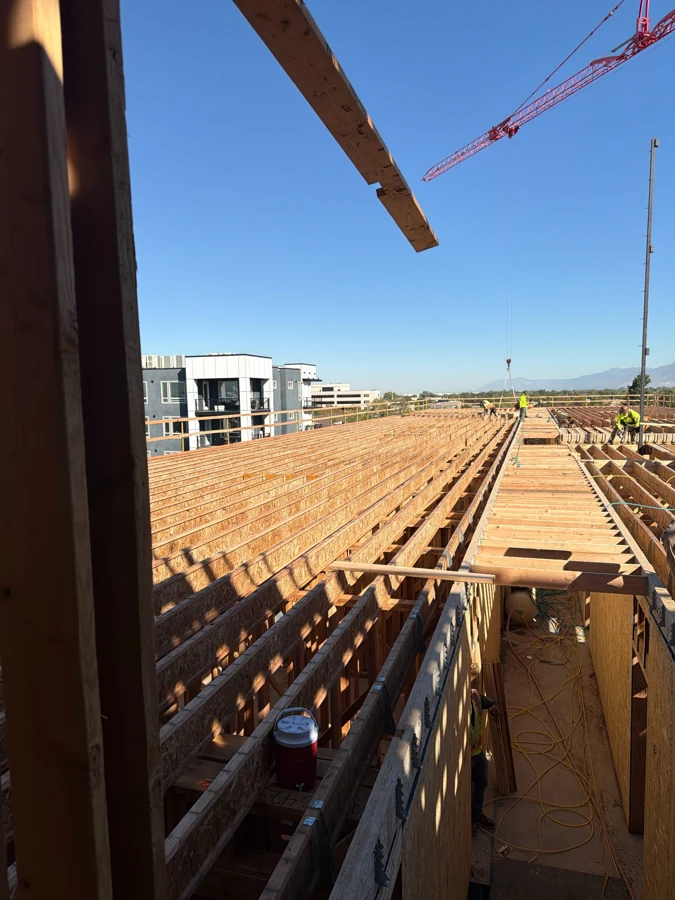 Upper level floor framing construction progress at The Collaborative 1881